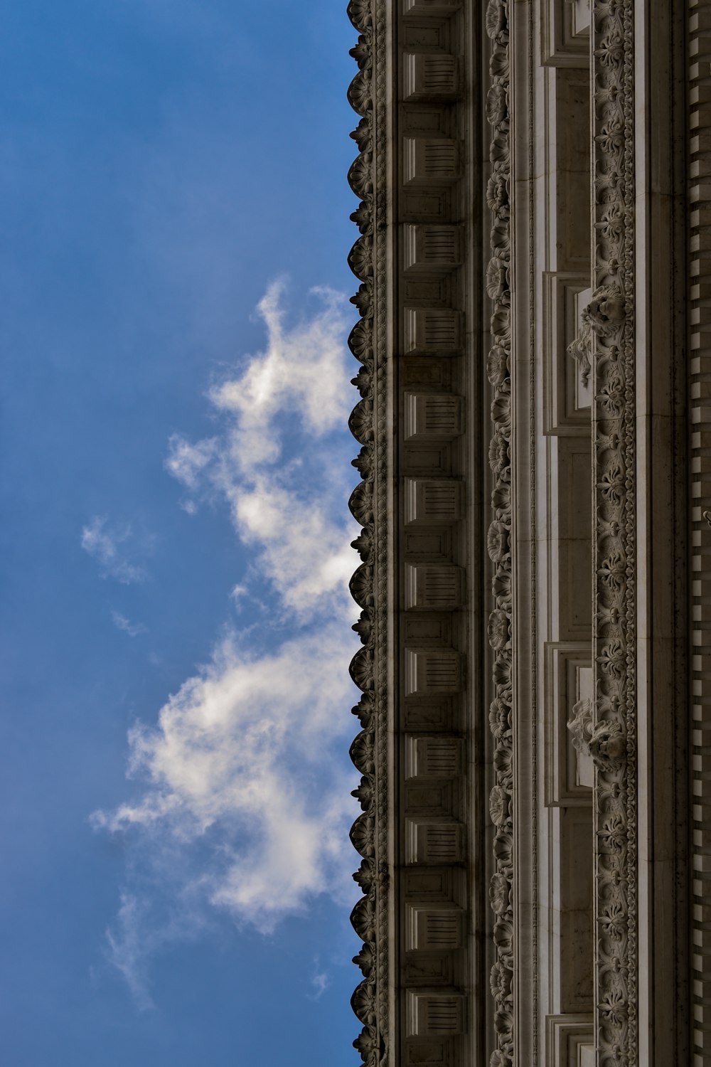 a tall building with a clock on the side of it