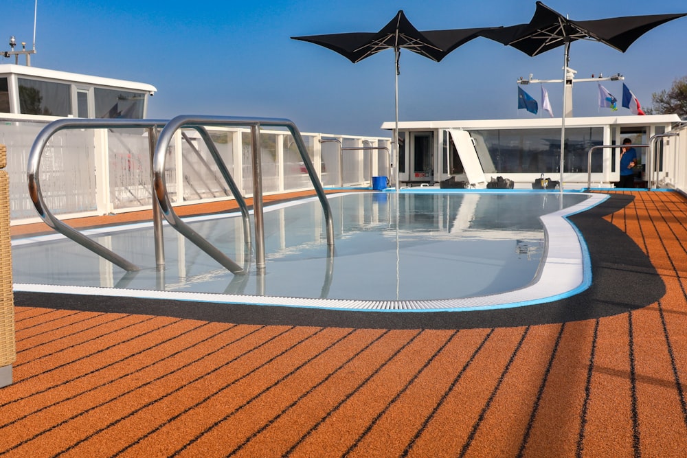 an empty swimming pool on a cruise ship