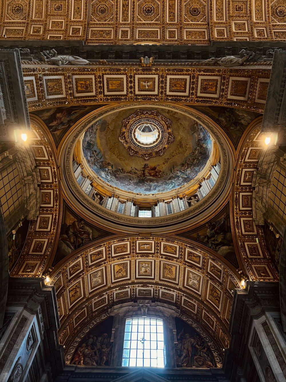the ceiling of a large building with a dome