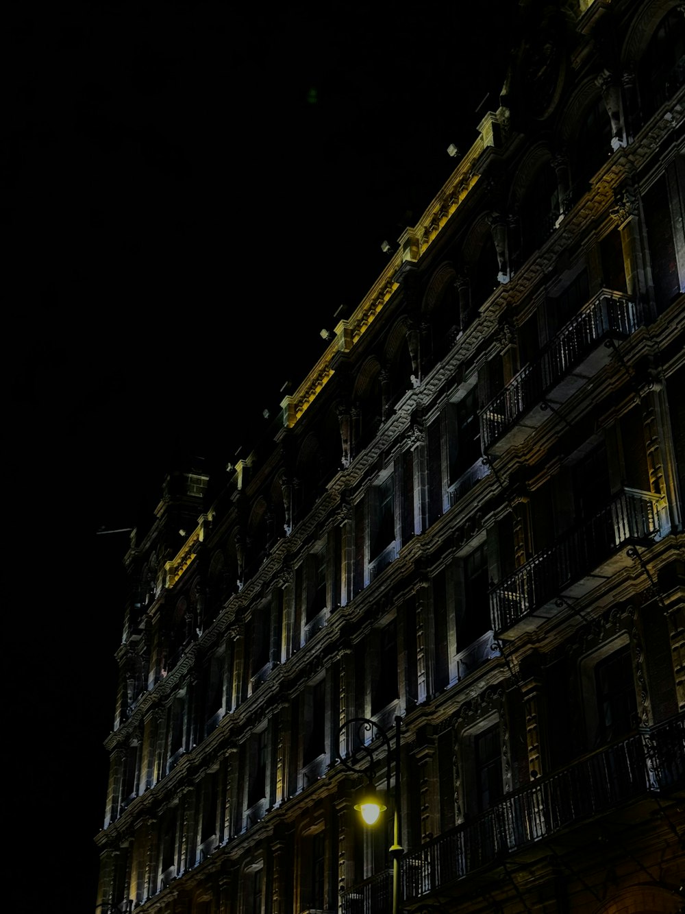 a very tall building lit up at night