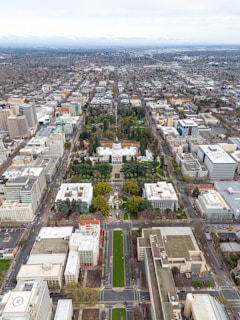 an aerial view of a city with lots of tall buildings