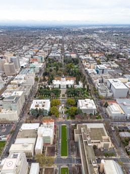 an aerial view of a city with lots of tall buildings