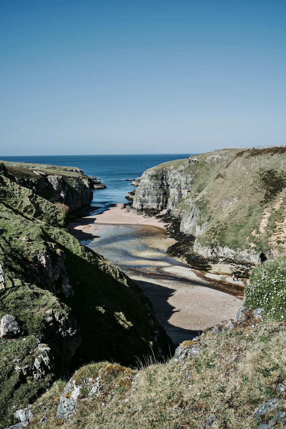 a view of the ocean from a cliff