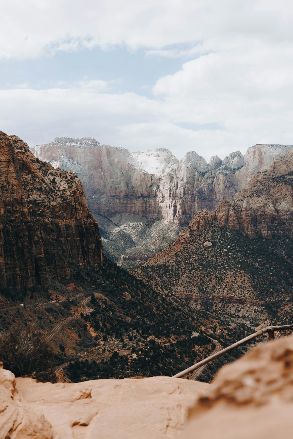 a view of a mountain range with snow on the mountains