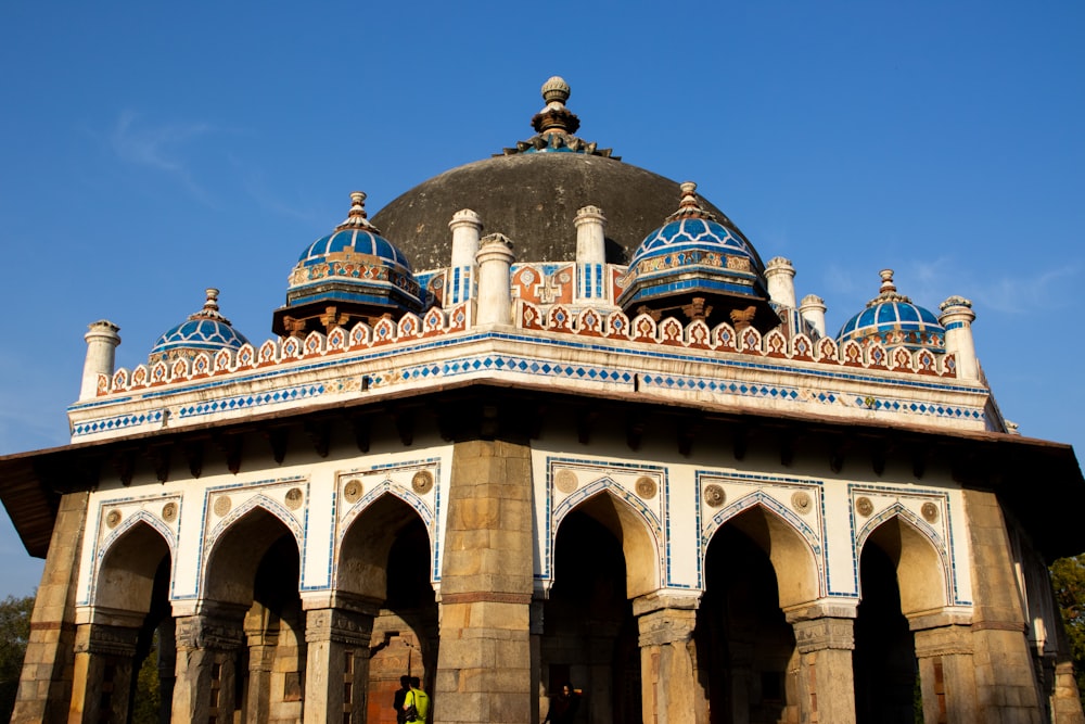 a large building with a blue dome on top of it