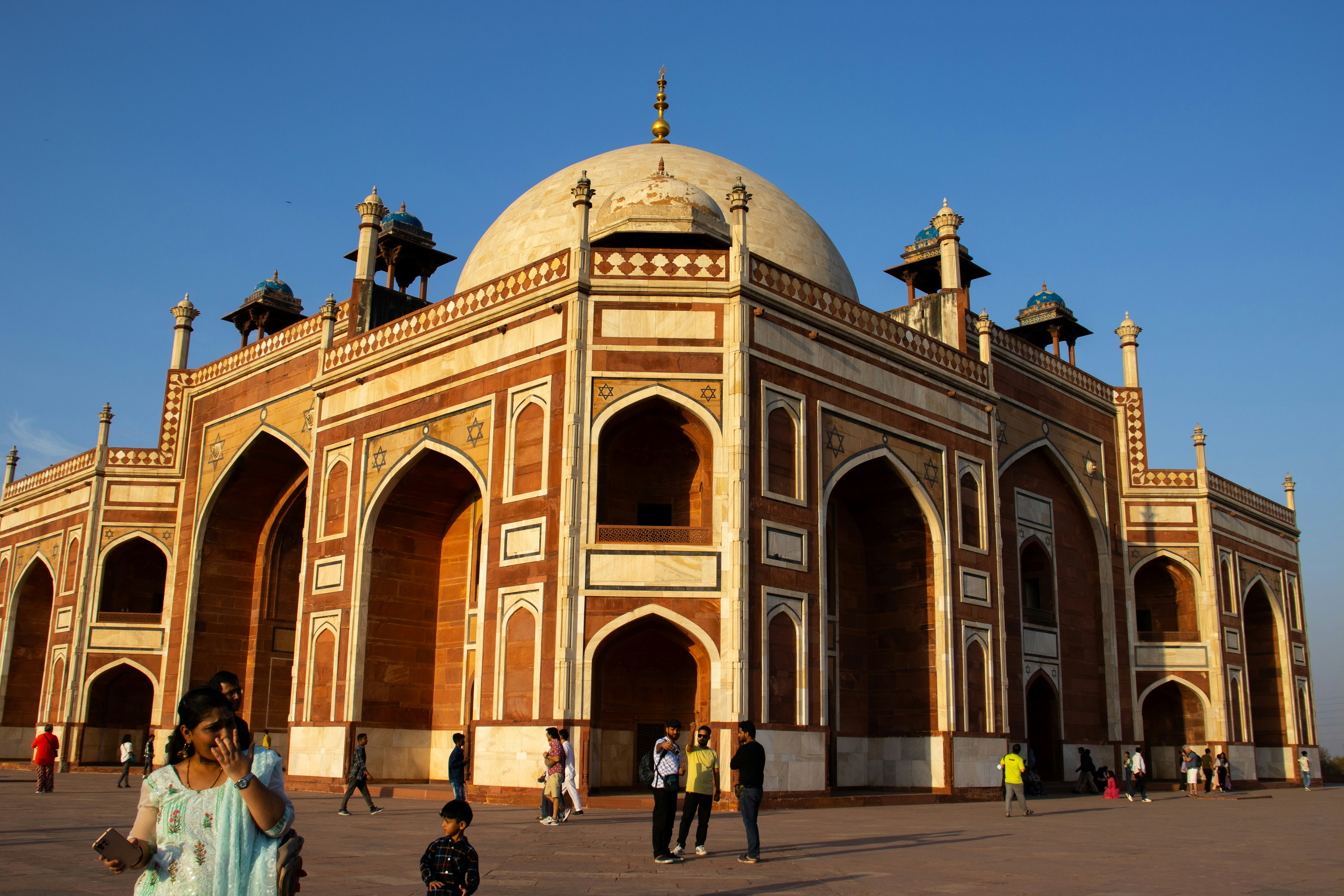 a group of people standing in front of a building
