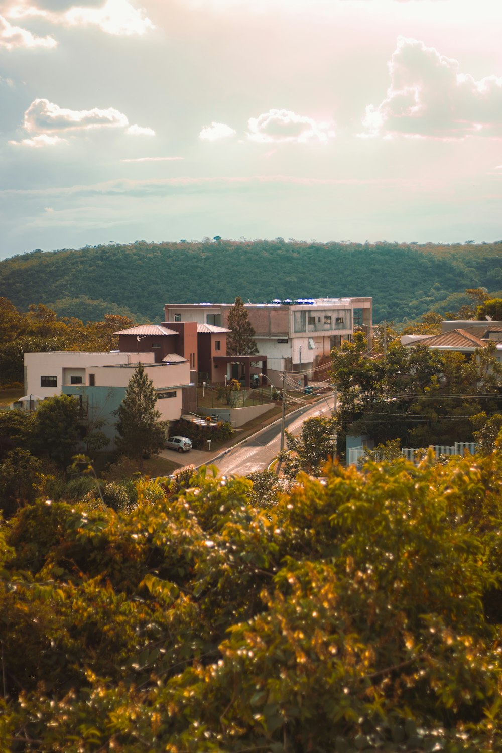 a view of a building from a hill