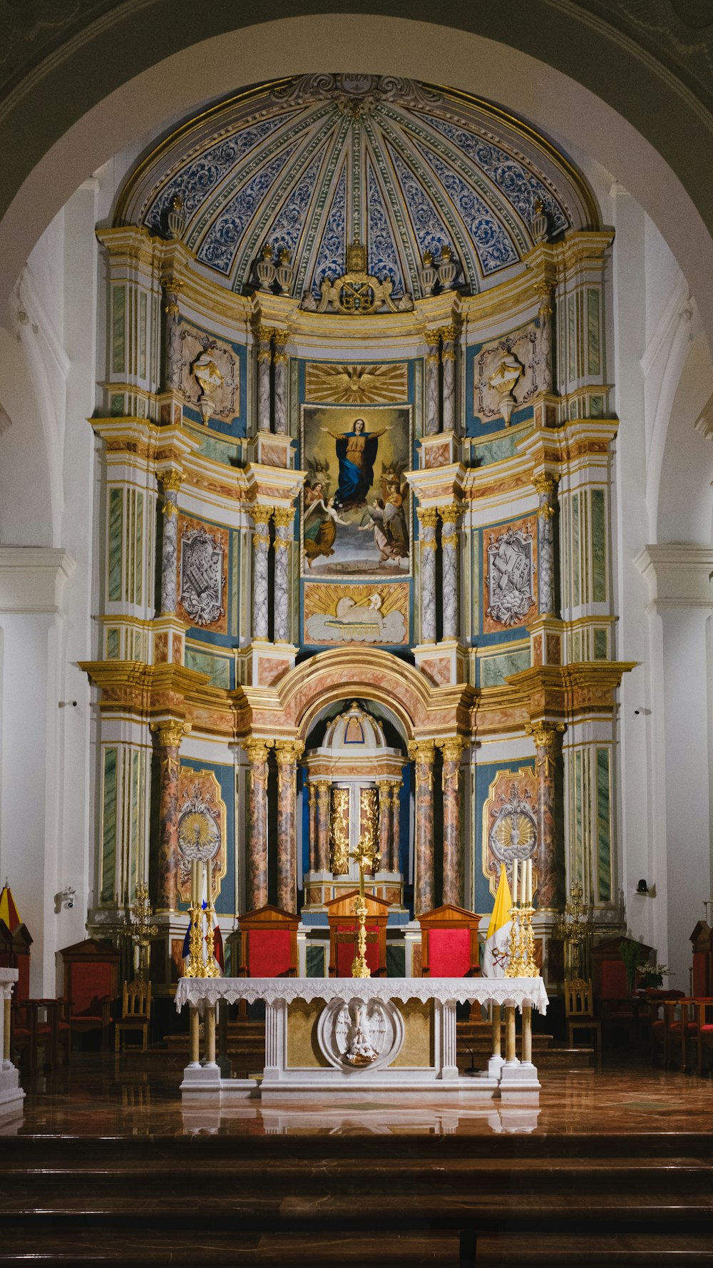 a church with a large alter in the middle of it