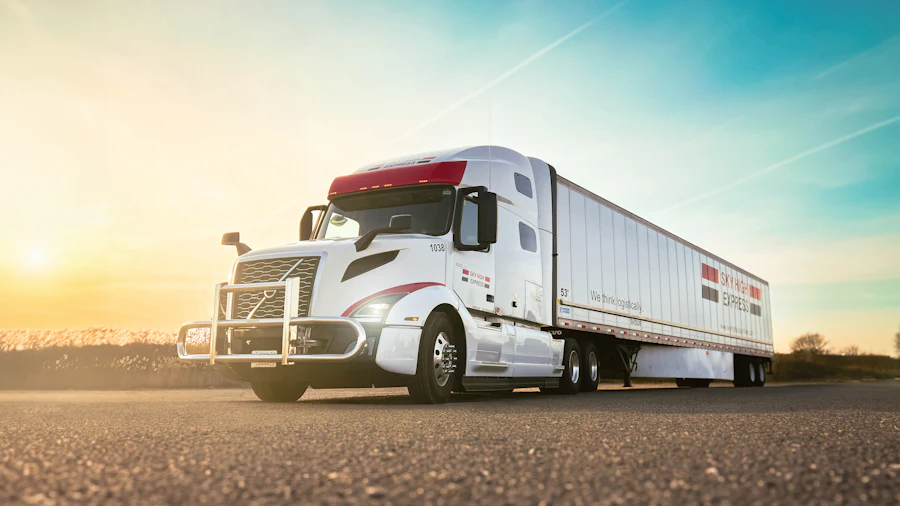 White semi-truck parked in warm evening light