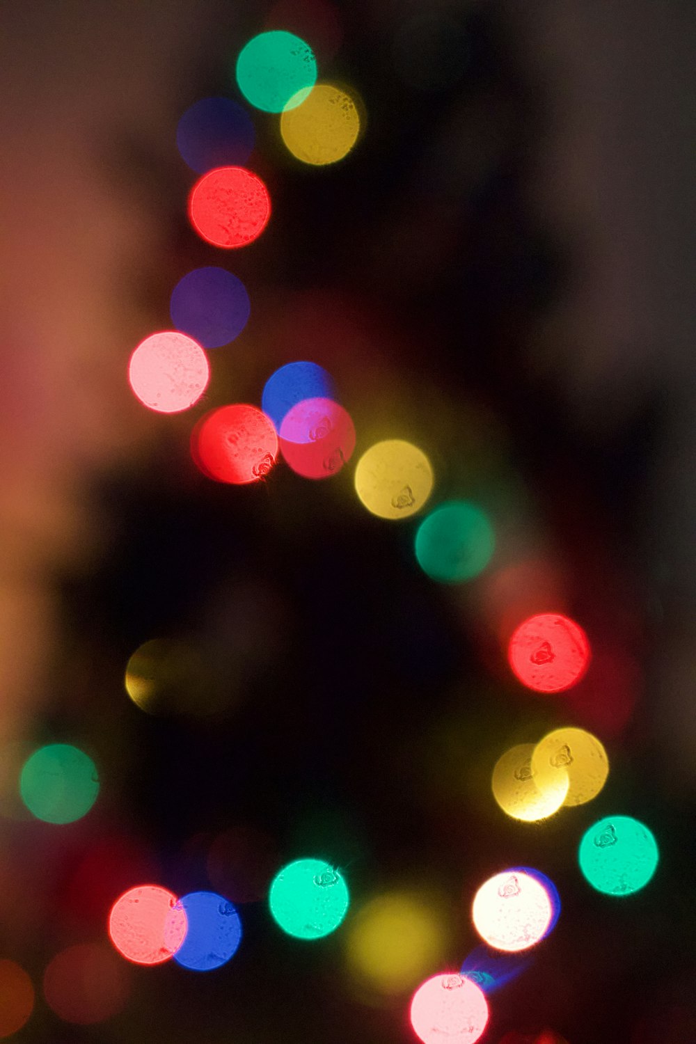 a close up of a lit christmas tree