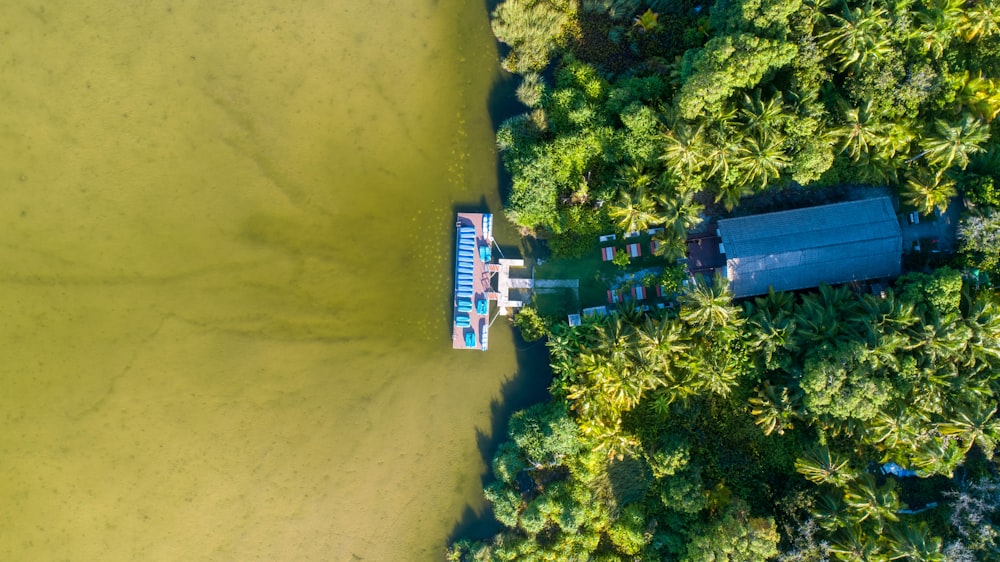 an aerial view of a boat in the water