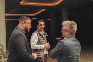 a group of men standing next to each other