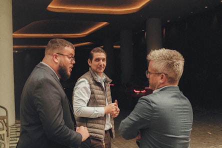 a group of men standing next to each other