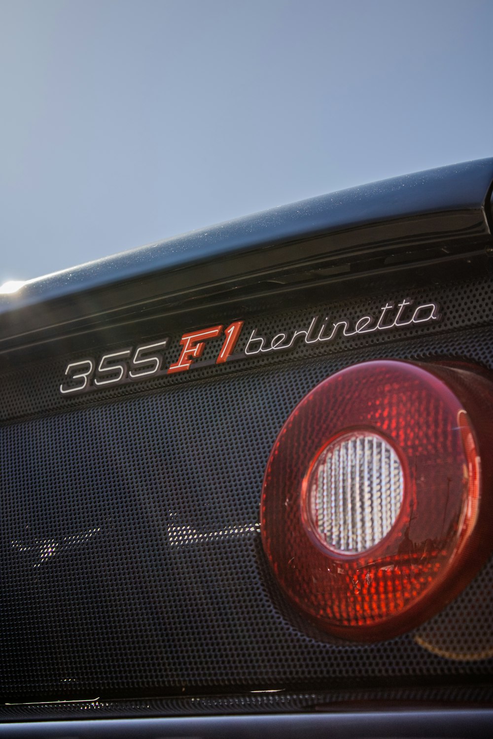 a close up of the tail light of a car