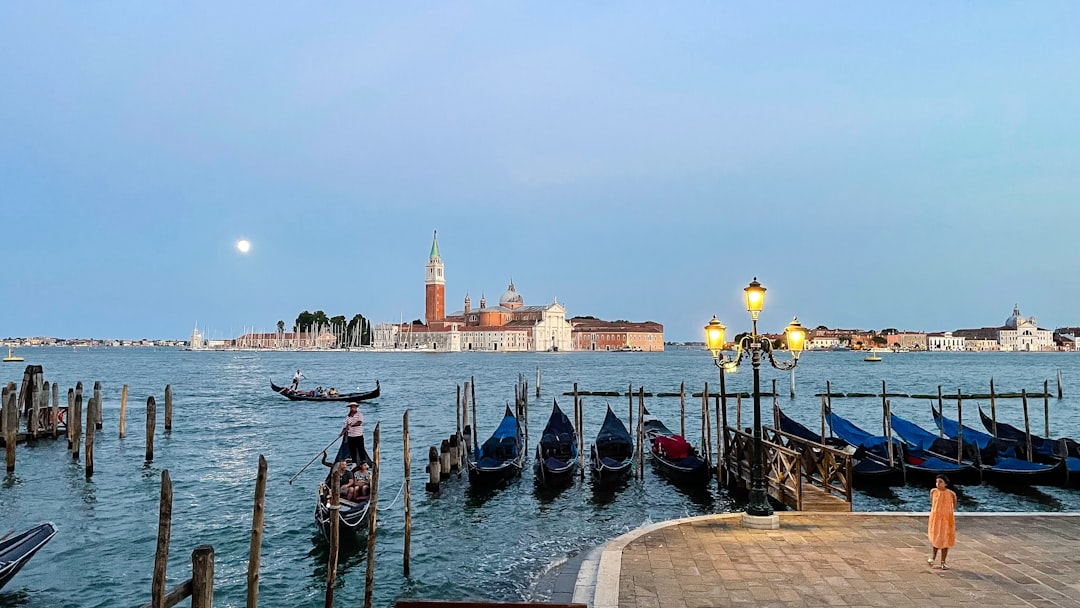 a bunch of boats that are sitting in the water,