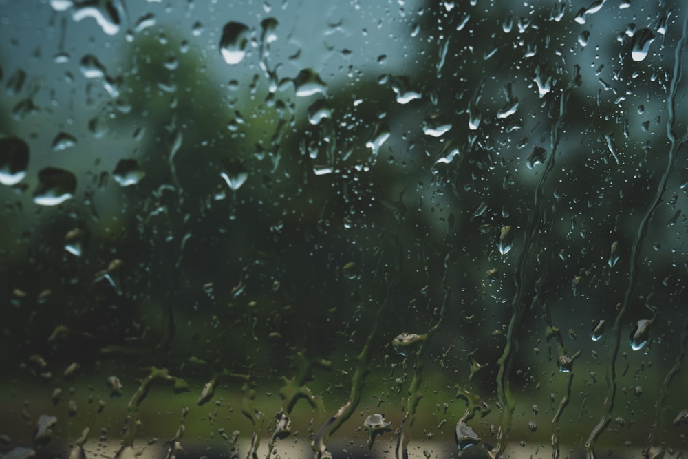 a window with rain drops on it