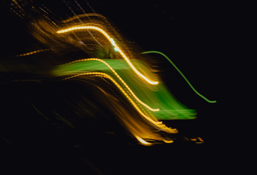 a blurry photo of a street light at night