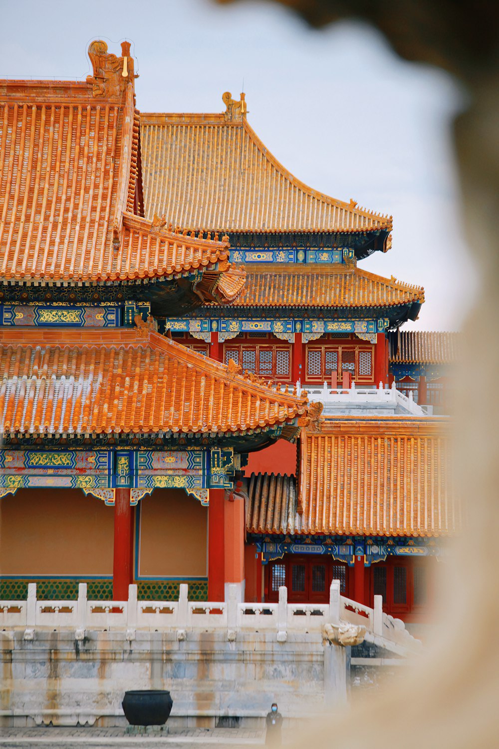 a view of a chinese building from across the street