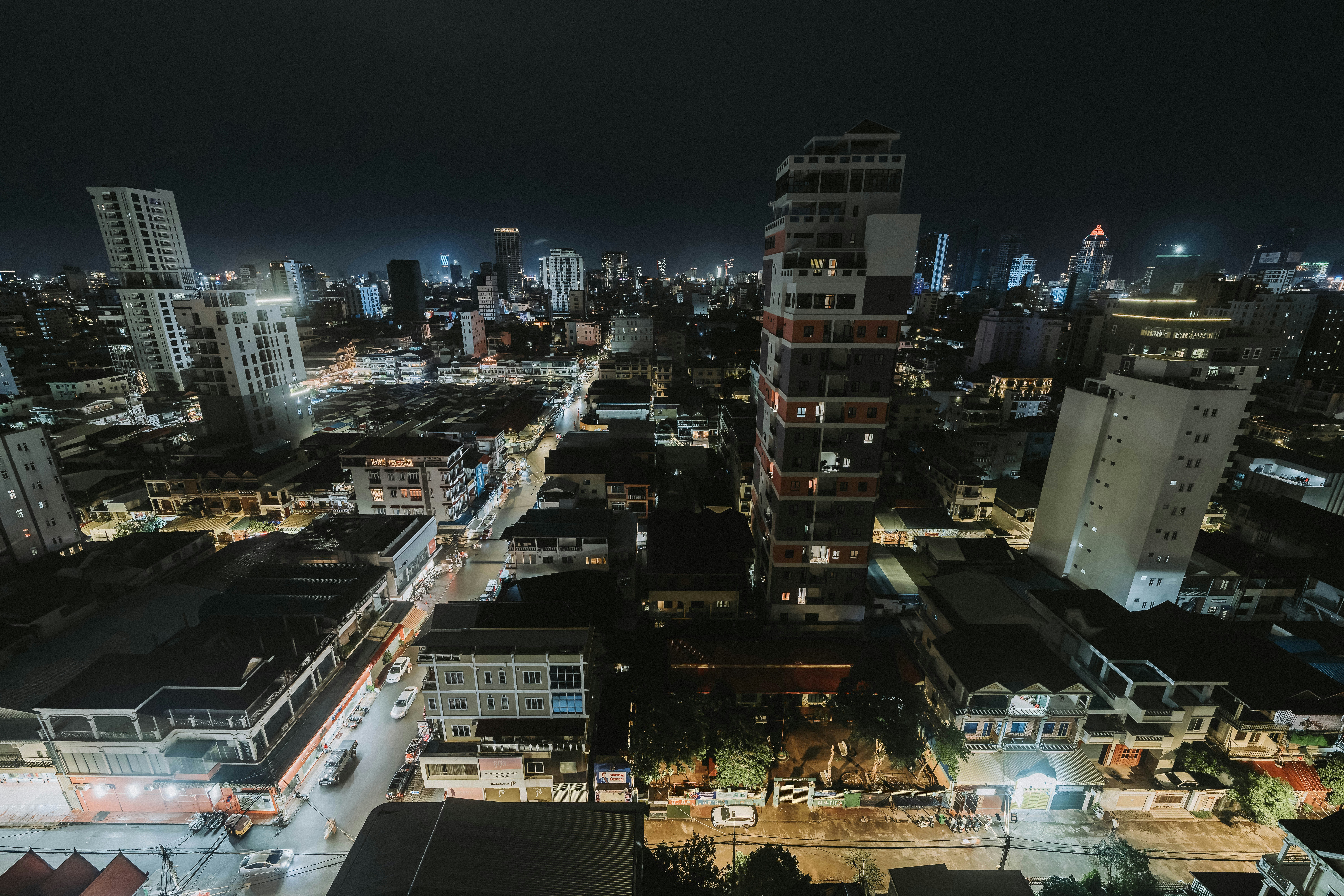 an aerial view of a city at night, 