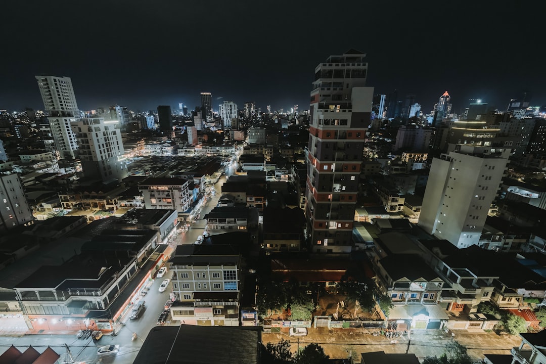 an aerial view of a city at night,