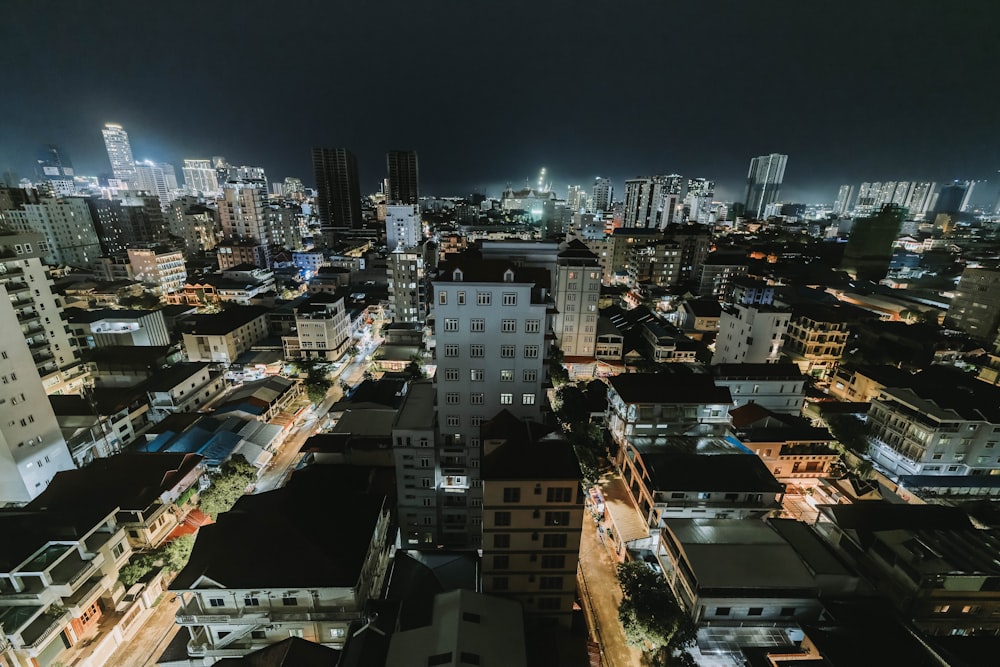 an aerial view of a city at night