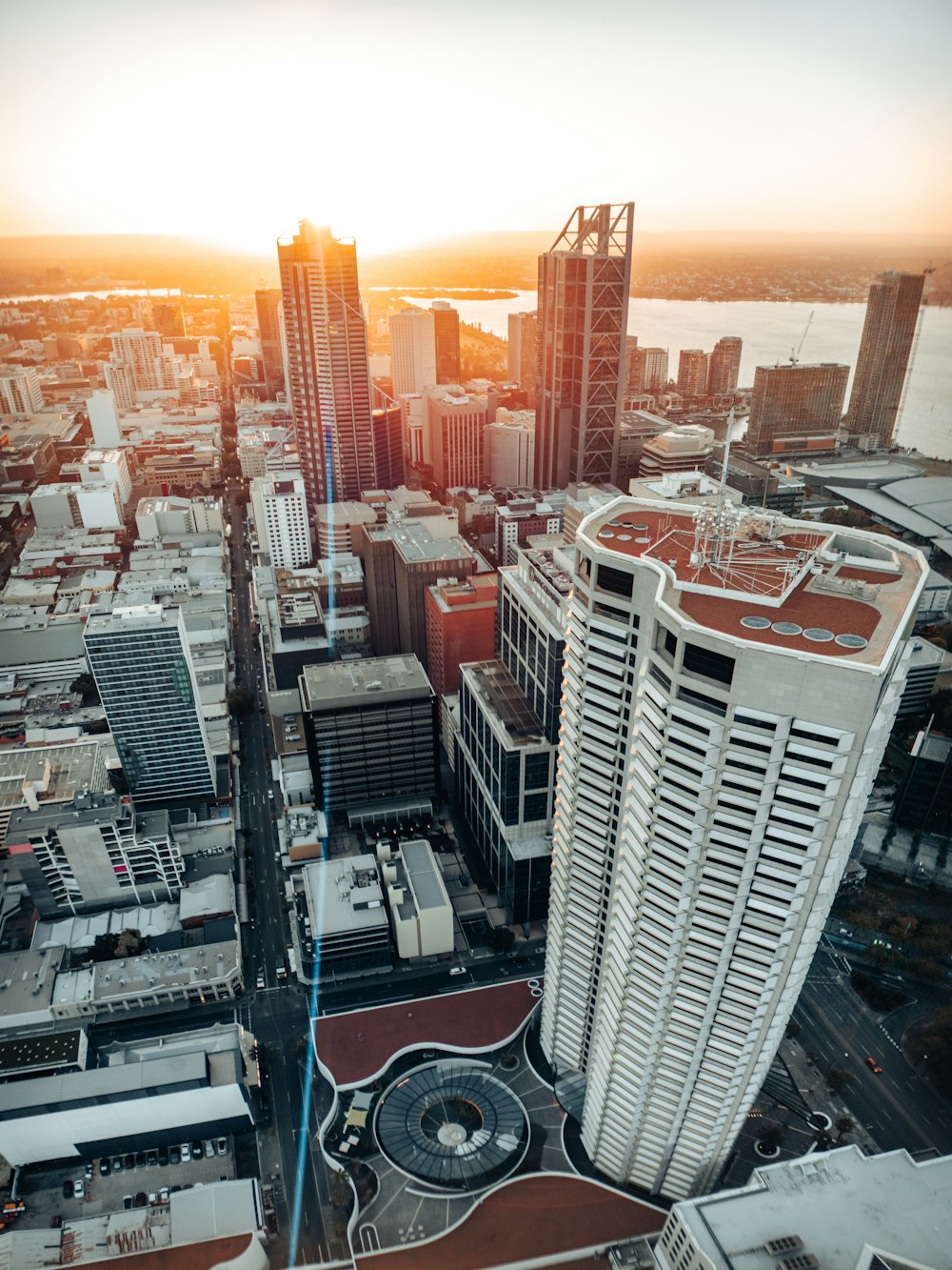 an aerial view of a city with tall buildings