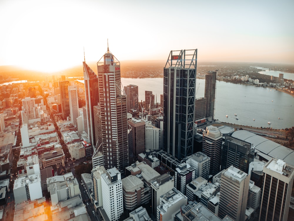 an aerial view of a city with tall buildings