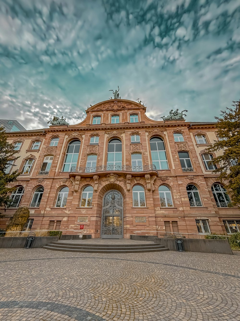 a large brick building with a clock tower on top of it