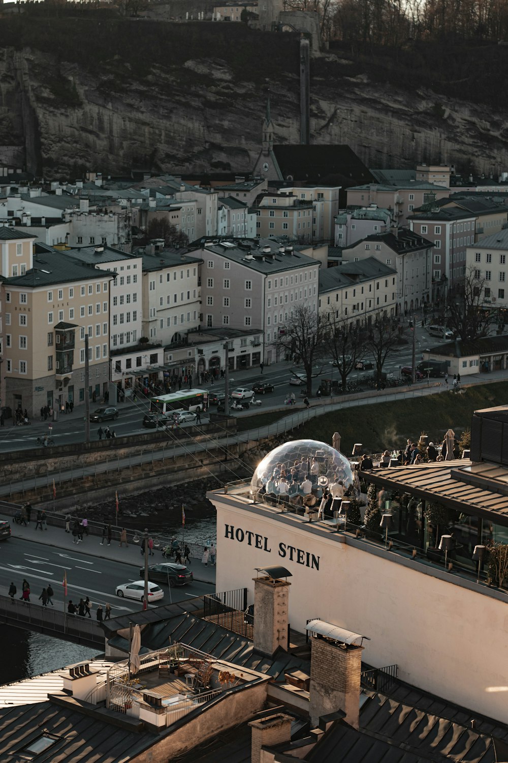 an aerial view of a city with buildings and people