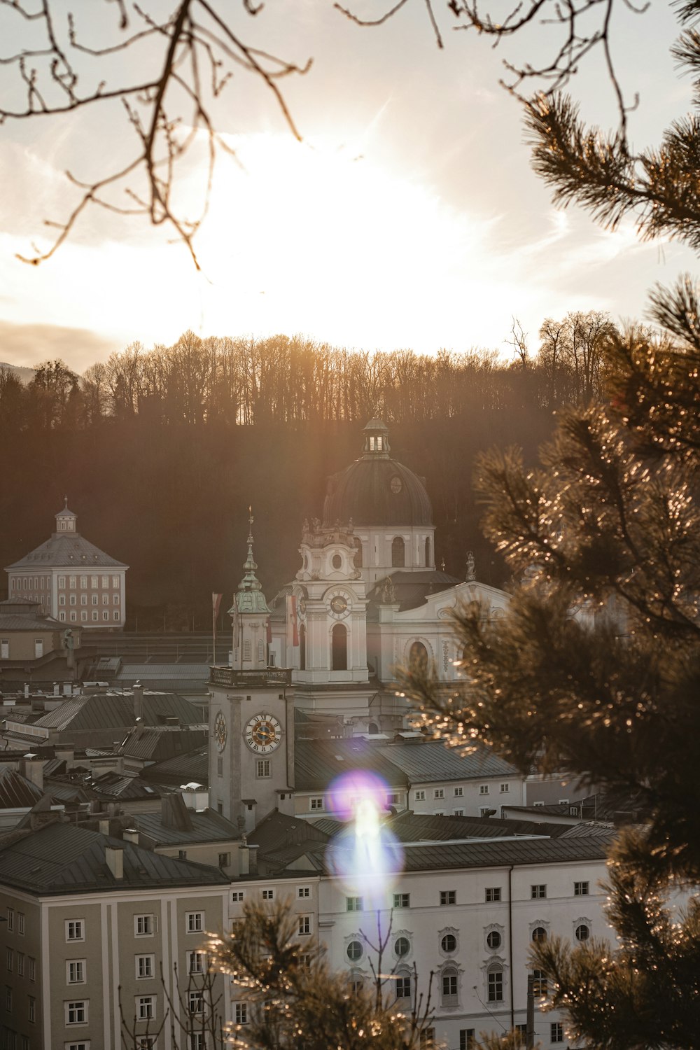 a view of a city with a church in the background