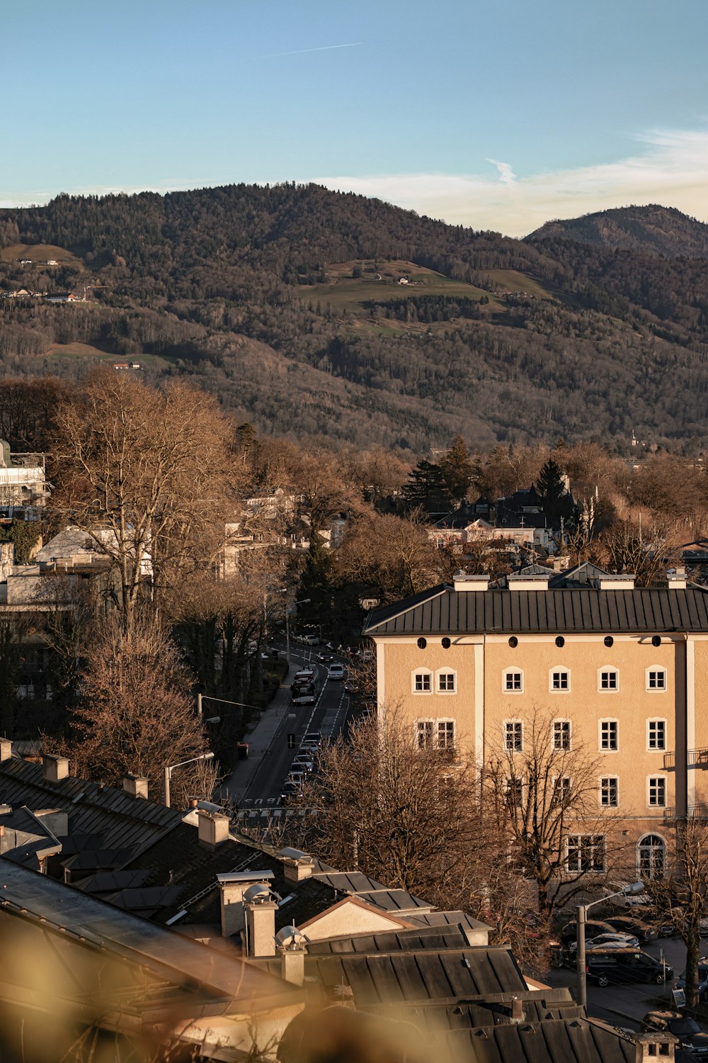 a view of a city with mountains in the background