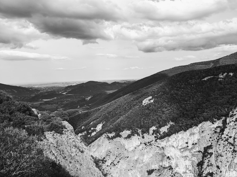 a black and white photo of a mountain range