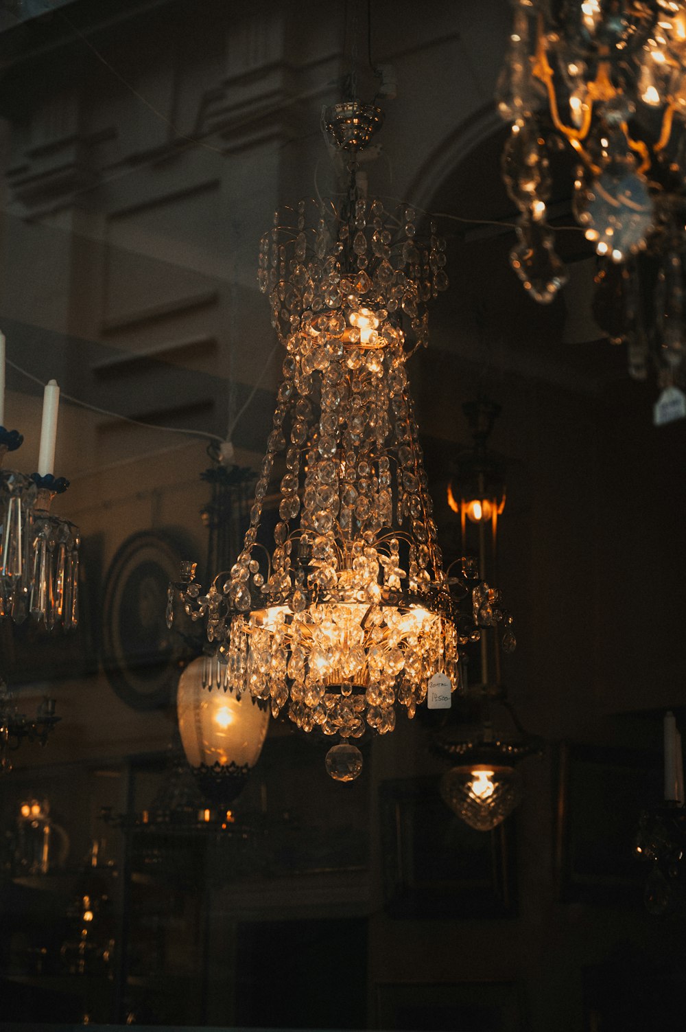 a bunch of chandeliers hanging from a ceiling