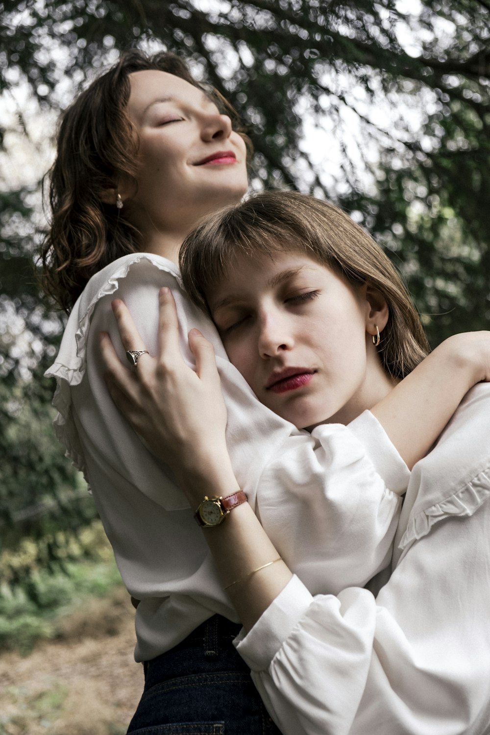 a woman holding another woman in her arms