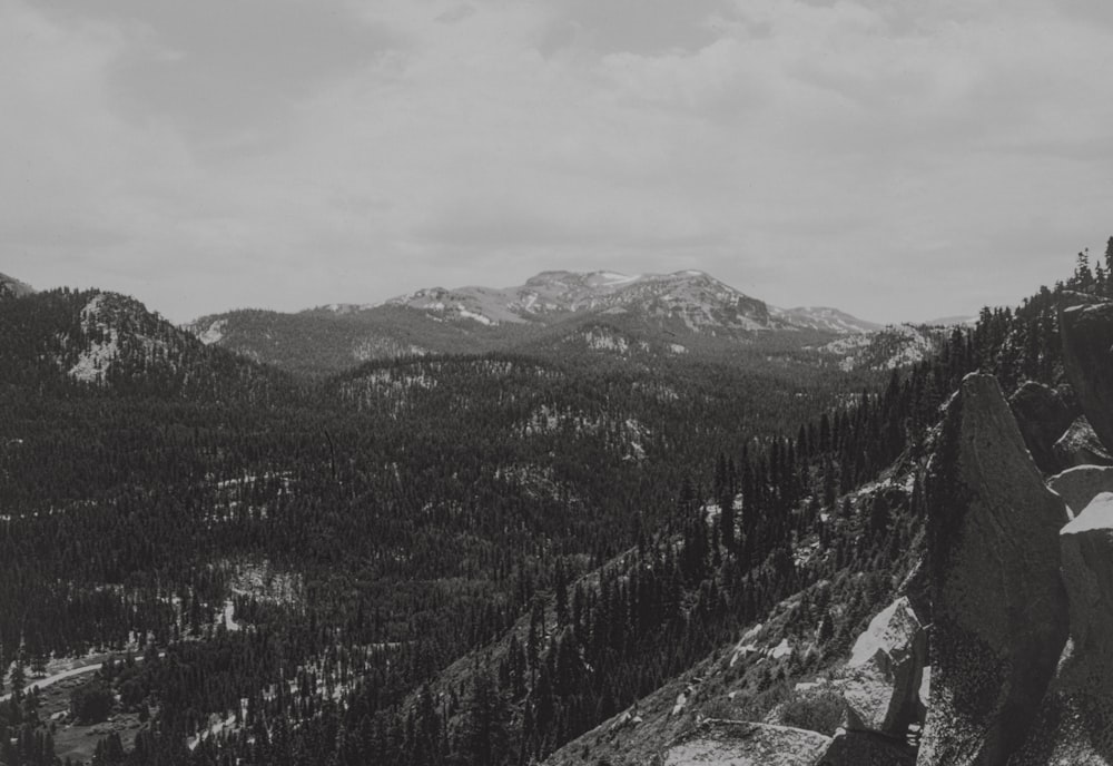 a black and white photo of a mountain range