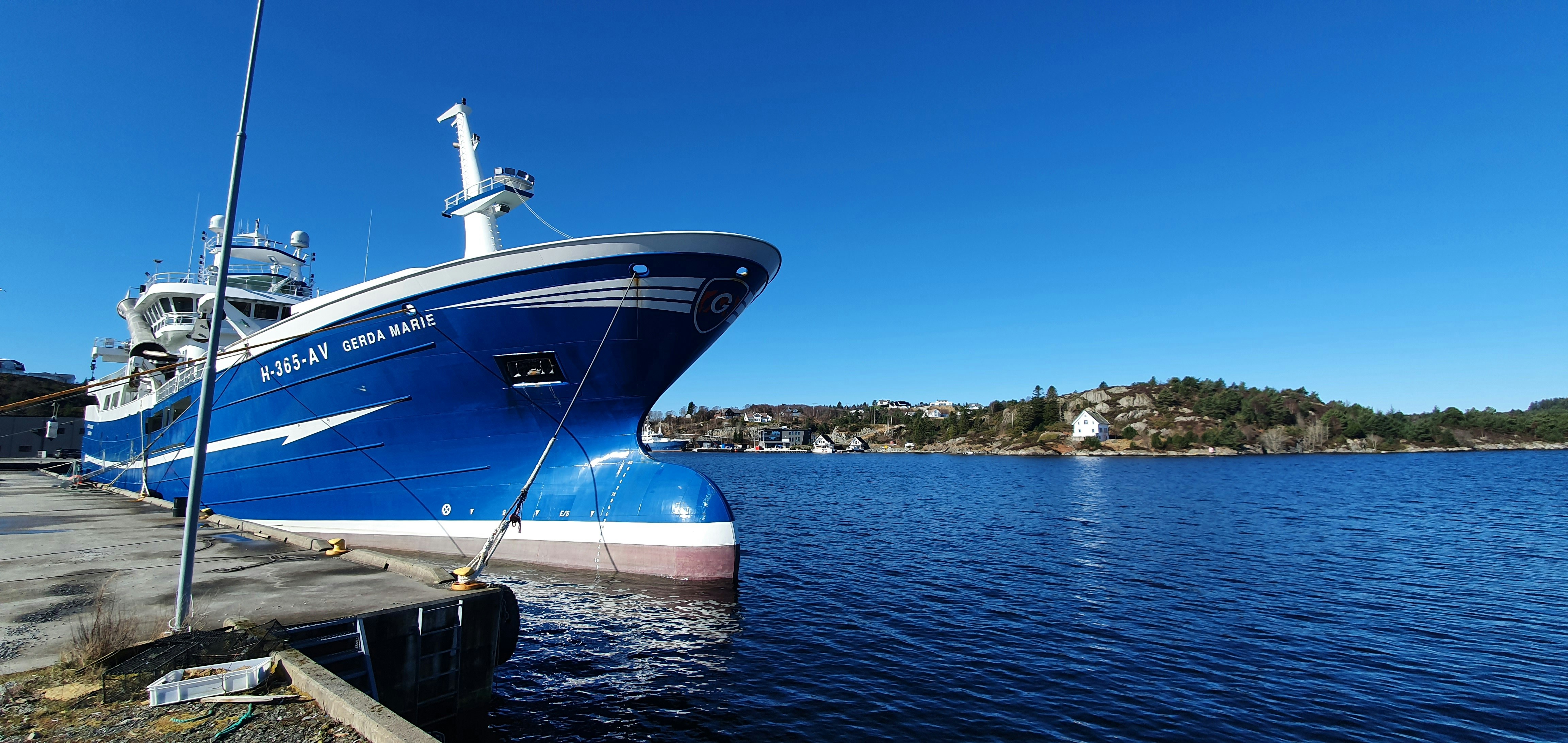 Commercial fishing vessel docked at pier representing the federal Limitation of Liability Act six-month claim window