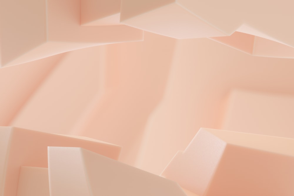 a close up of a pink wall with many different shapes