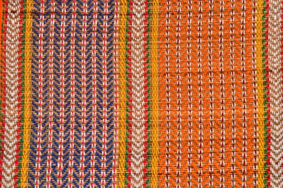 a close up view of a woven material