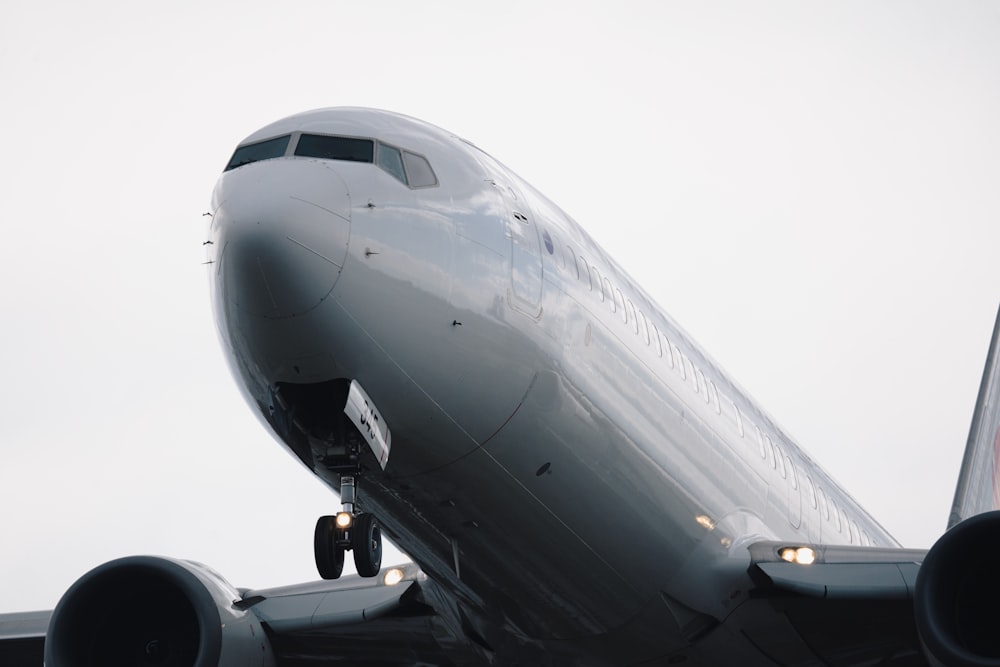 a large jetliner sitting on top of an airport tarmac