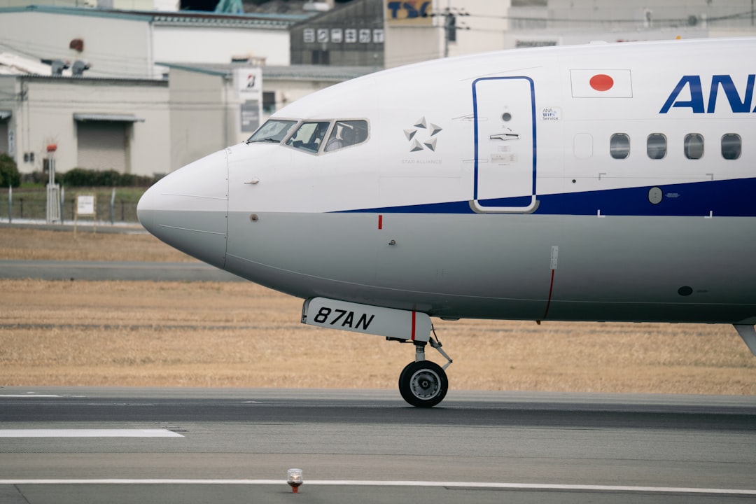 a large commercial airplane on a run way,