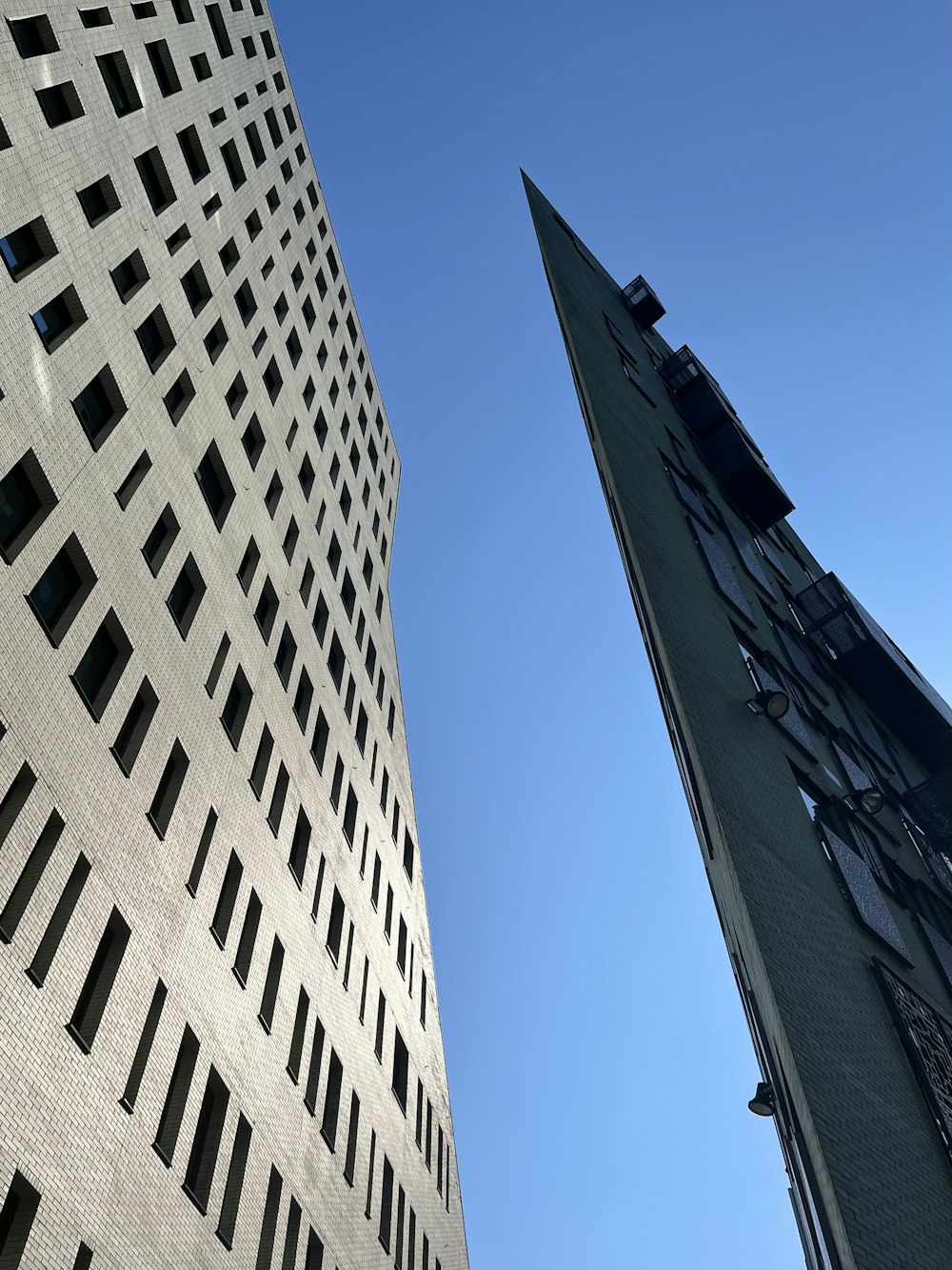 a tall building with a clock on the side of it