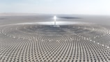 a large solar array in the middle of a desert