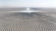 a large solar array in the middle of a desert