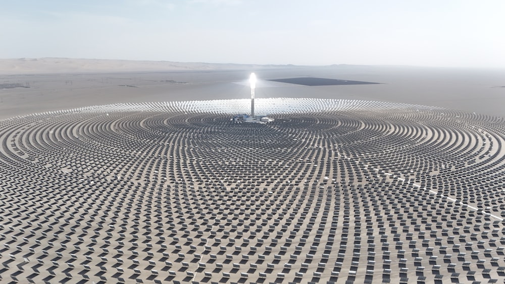 a large solar array in the middle of a desert