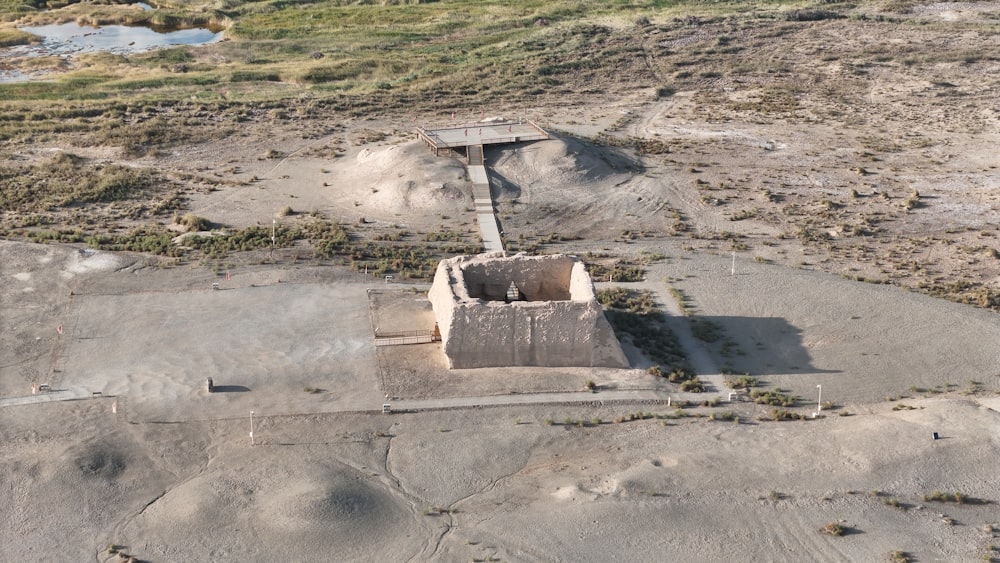 an aerial view of a building in the middle of nowhere