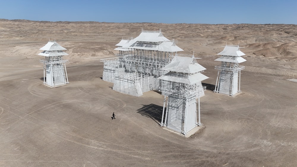 an aerial view of a building in the desert