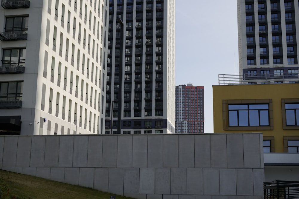 a group of tall buildings sitting next to each other