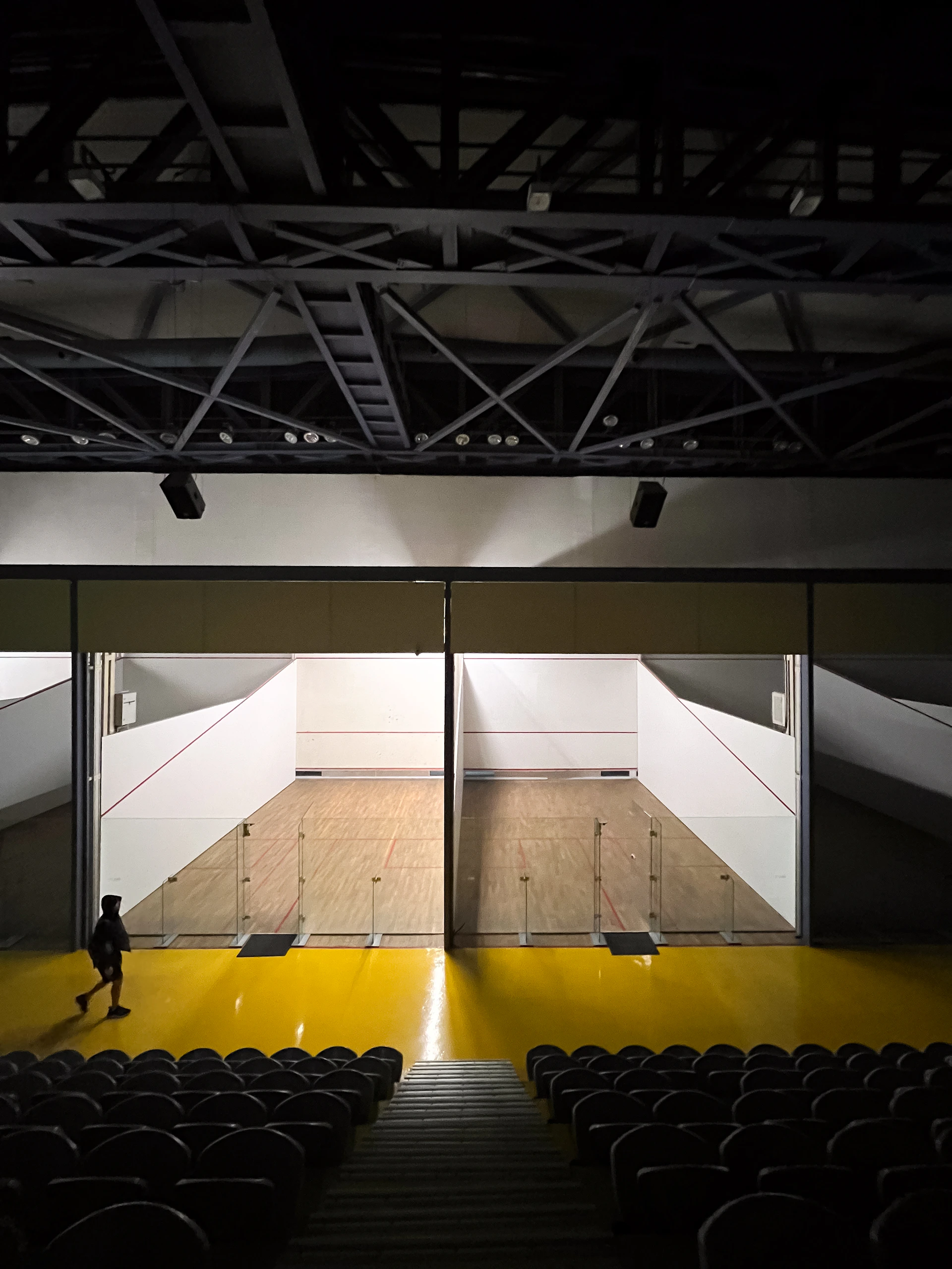 a person standing in front of an empty stage