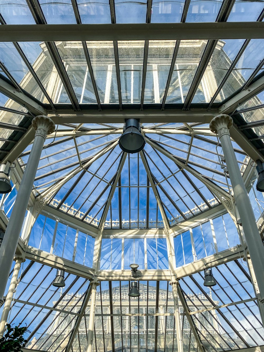 the inside of a building with a glass ceiling