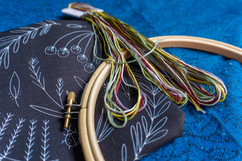 a close up of a pair of scissors and a piece of fabric